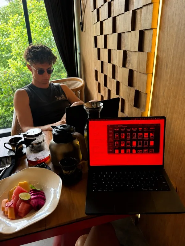 Working at a cafe with warm Sundown display filter