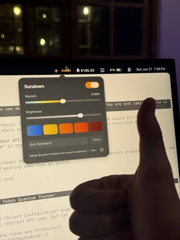 User giving thumbs up with warm screen filter